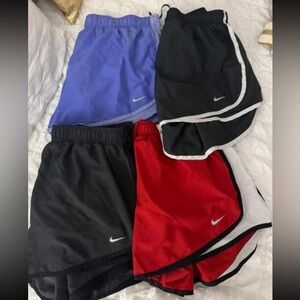 4 Nike shorts shorts sold all together